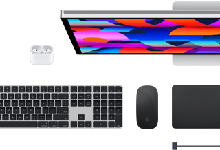 Mac accessories: AirPods, Studio Display, Magic Keyboard, Magic Mouse, Magic Trackpad, MagSafe charge cable in Midnight color